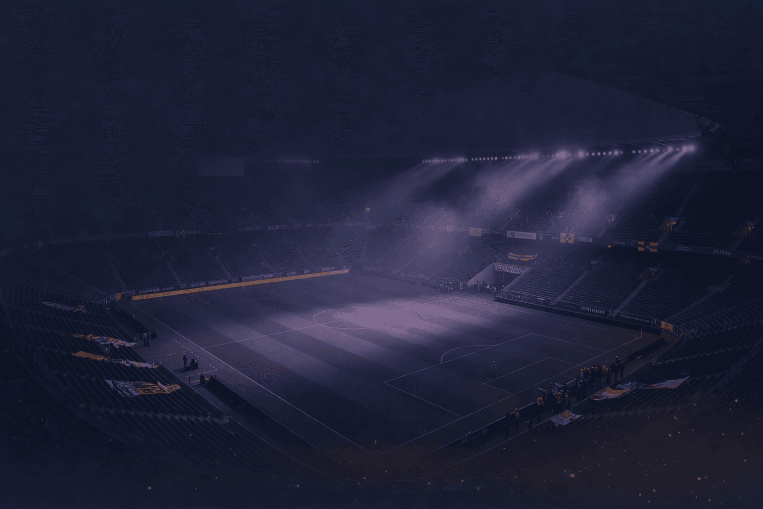 A calm post-event stadium atmosphere that suggests support continuing after the final moment.